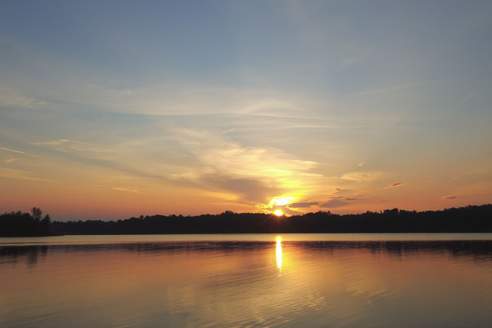 A serene lake at sunset